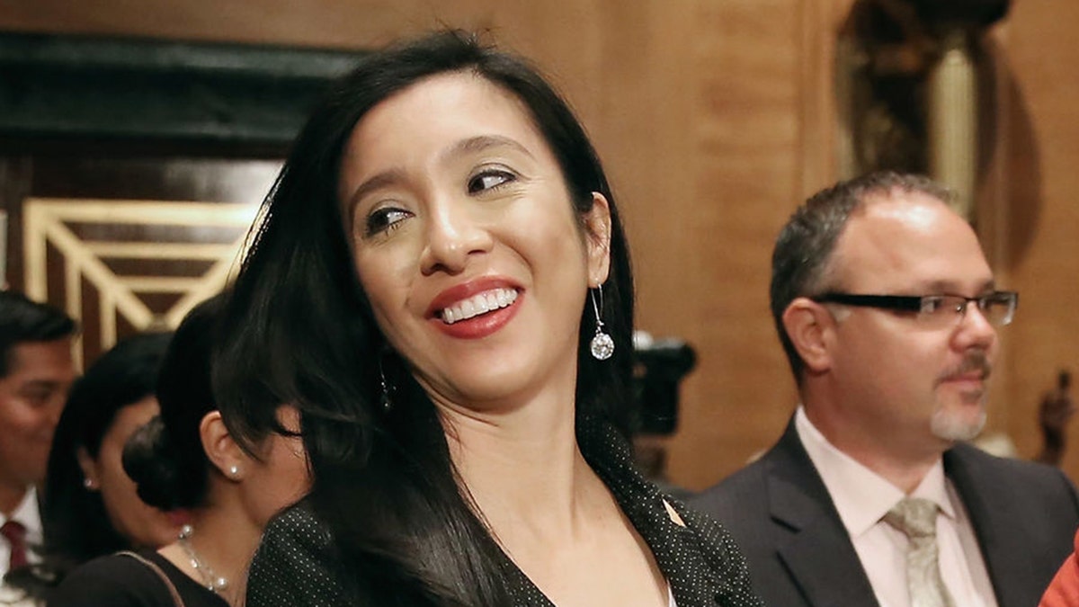 FILE: Erica Lira Castro (C), wife of Julian Castro, attends his confirmation hearing before the Senate Banking, Housing and Urban Affairs Committee in the Dirksen Senate Office Building on Capitol Hill June 17, 2014 in Washington, DC. (Photo by Chip Somodevilla/Getty Images)