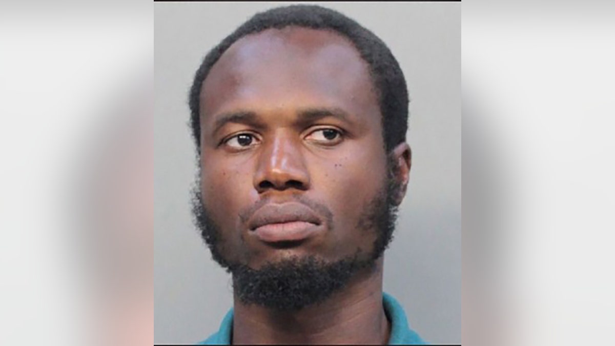 Holdson Marcelin, 38, allegedly smeared blood on an American flag at a Florida village hall.