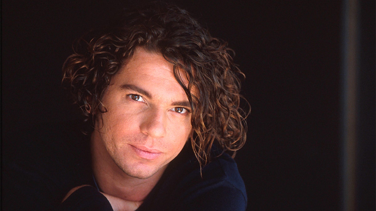 Michael Hutchence of INXS, studio portrait, London, 1990.