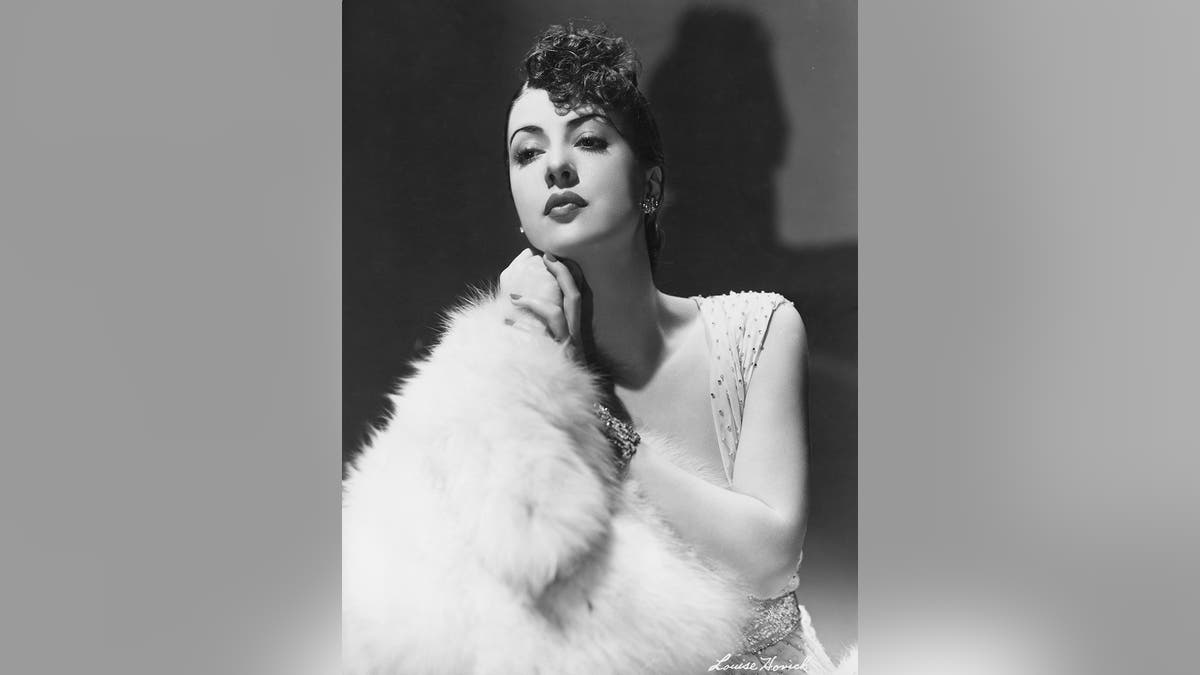 Gypsy Rose Lee (1914 - 1970), then known as Louise Hovick, in a publicity still for her debut film, 'You Can't Have Everything', directed by Norman Taurog, 1937.