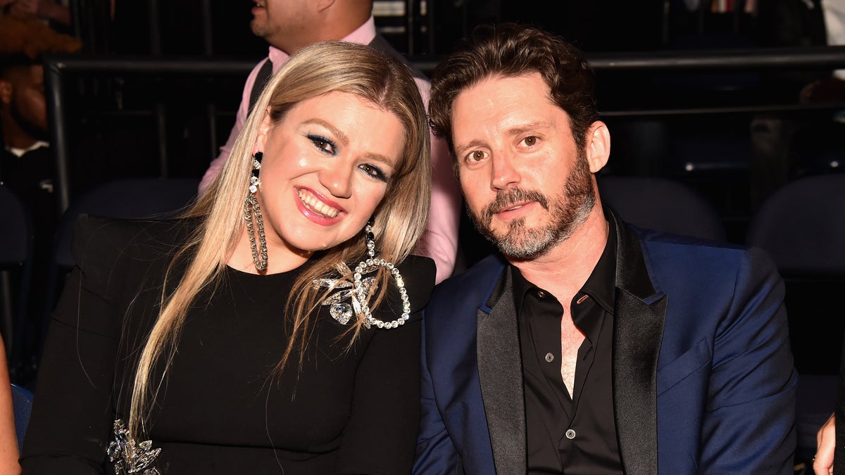 Kelly Clarkson and Brandon Blackstock at an awards show.