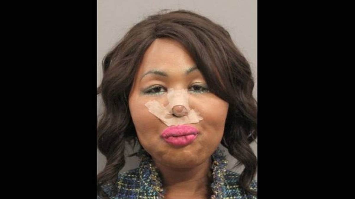 Jimmy Maurice Lewis II, known as "Iconic Facce," allegedly robbed a bank to pay for her plastic surgery. (Gulfport Police Department)