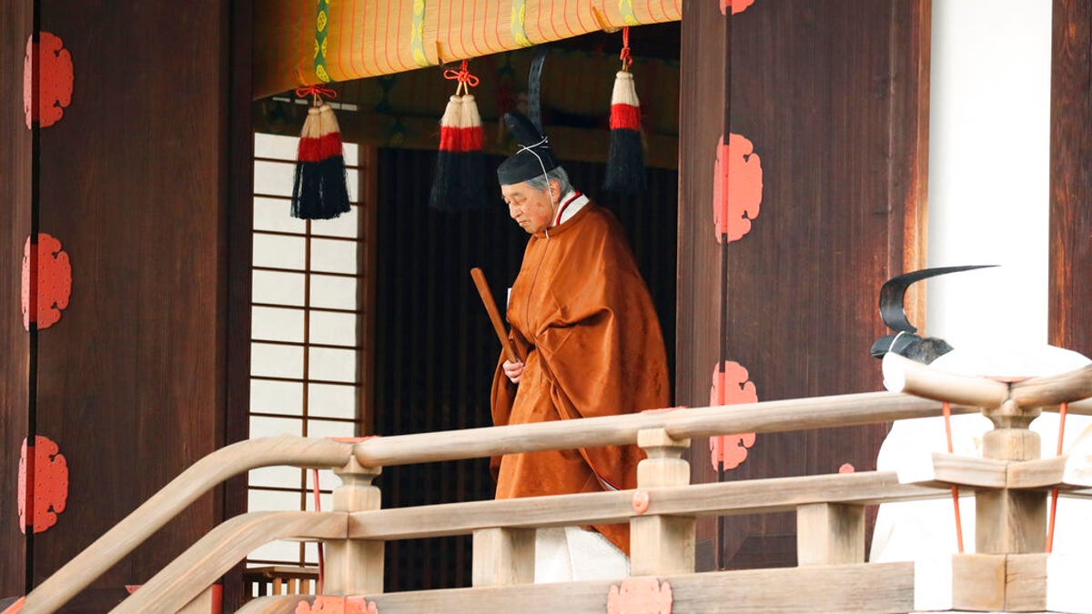Japan's Emperor Akihito leaves after a ritual to report his abdication to the throne, at the Imperial Palace in Tokyo, Tuesday, April 30, 2019. 