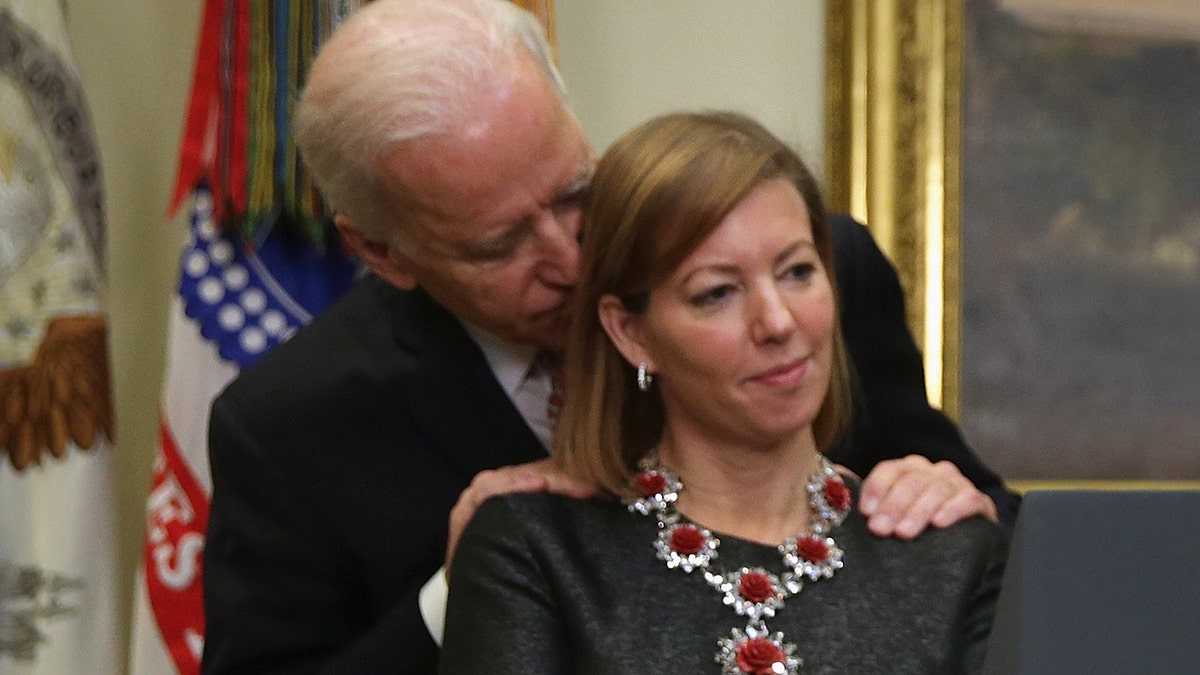 Biden with Stephanie Carter in February 2015 at the White House. (Alex Wong/Getty Images, File)