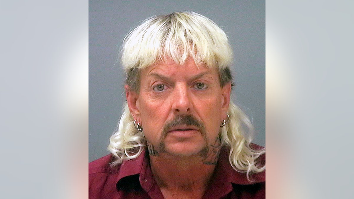 This file photo provided by the Santa Rose County Jail in Milton, Fla., shows Joseph Maldonado-Passage. Prosecutors say Maldonado-Passage, also known as Joe Exotic, tried to arrange the killing of Carole Baskin, the founder of Big Cat Rescue.