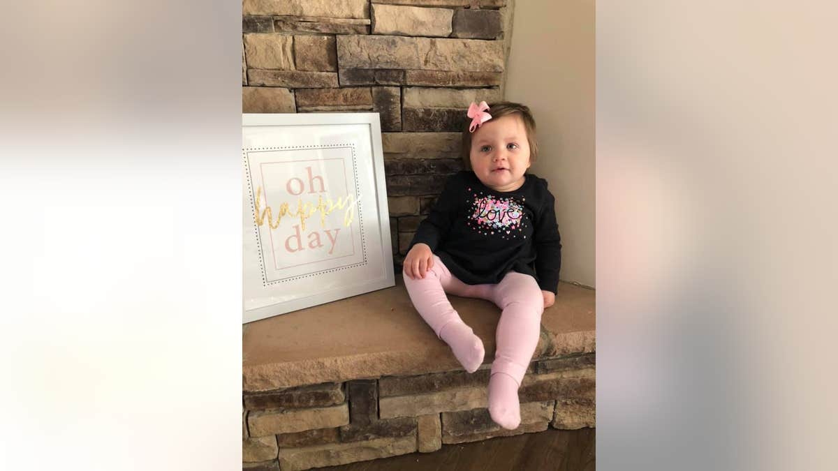 Molly Hughes posed for photos to celebrate beating cancer.