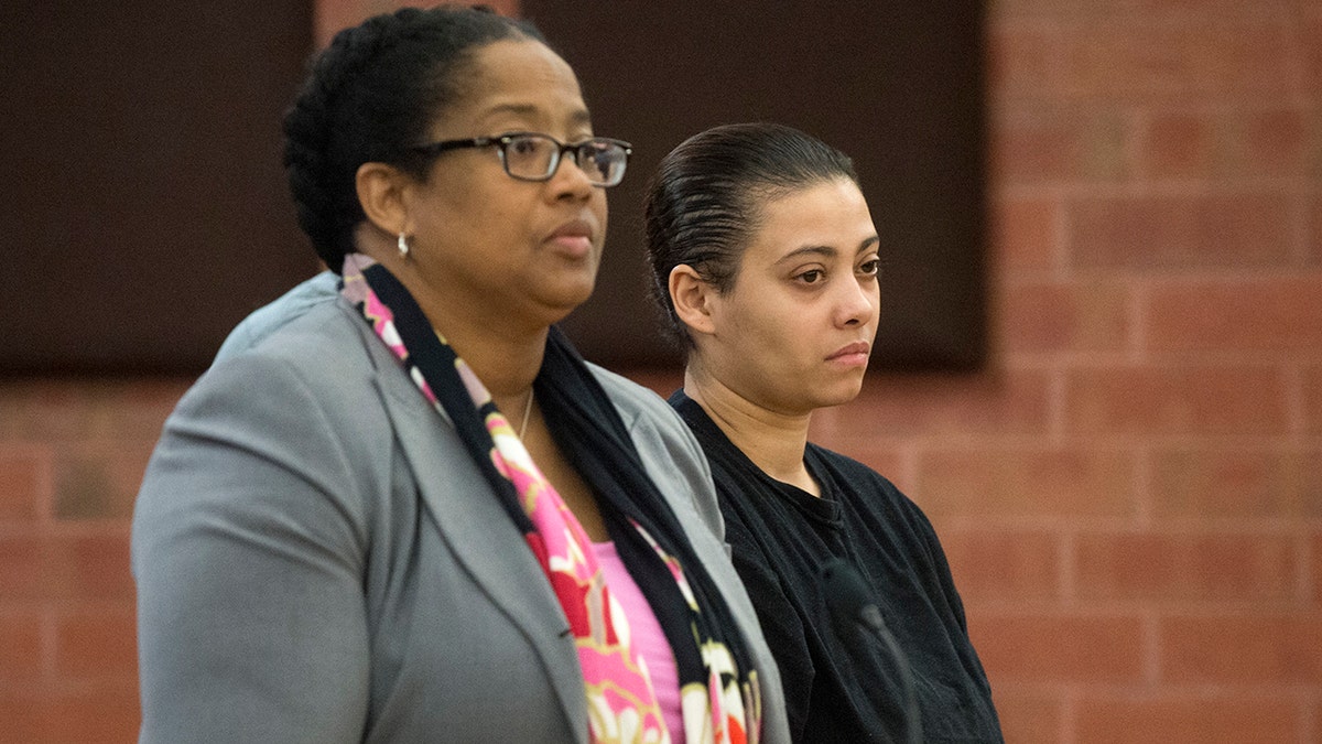 Katiria Tirado, 33, right, the Hartford mother charged in the death of her 17-year-old autistic son, Matthew Tirado, appears in Hartford Superior Court on Tuesday, March 21, 2017.