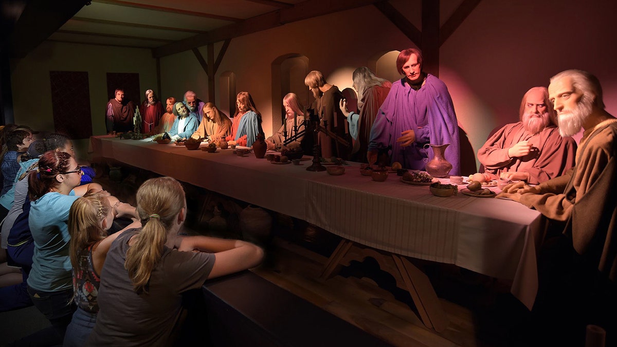 Visitors view the "Last Supper" at the BibleWalk wax museum in Mansfield, Ohio.