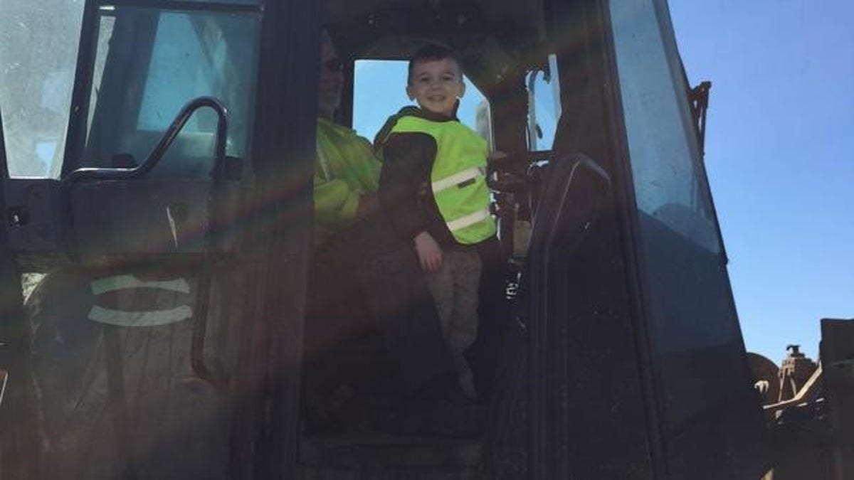 Pictures from Ethan’s big day also show him touring the area’s local Waste Management facility.