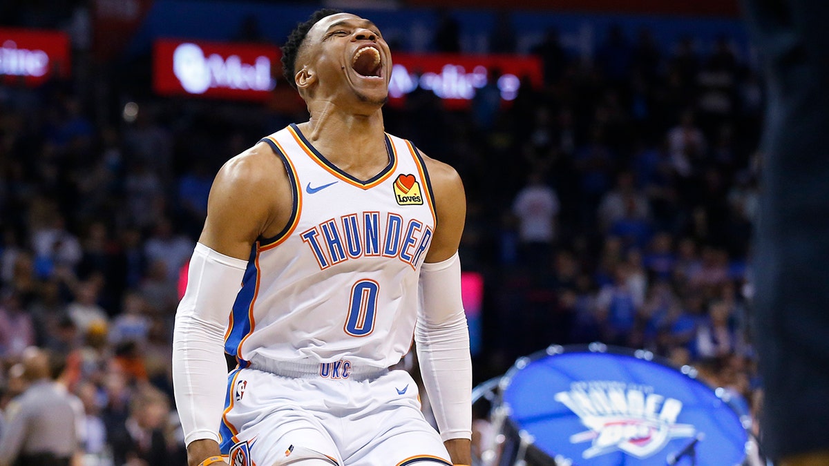 Oklahoma City Thunder guard Russell Westbrook (0) runs out and roars to the crowd before an NBA basketball game against the Los Angeles Lakers Tuesday, April 2, 2019, in Oklahoma City.