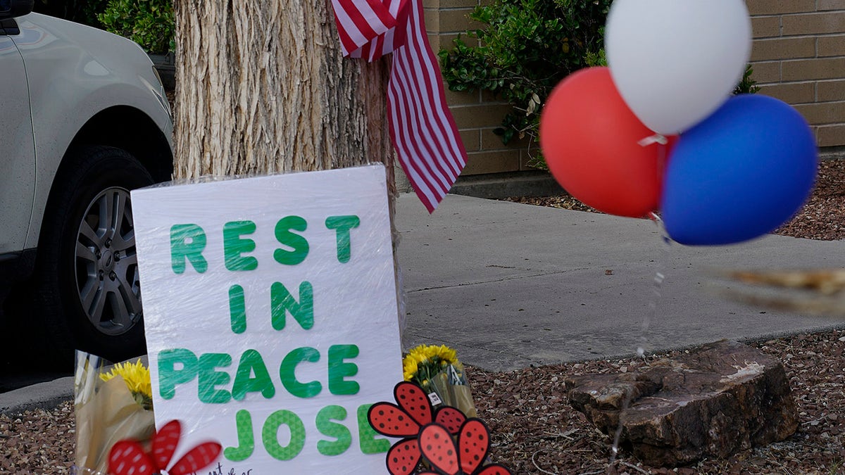A makeshift memorial in honor of the mail carrier fatally shot Monday in Southwest Albuquerque, New Mexico is seen in front of the Five Points Postal Station, photographed on April 23, 2019. (Associated Press)