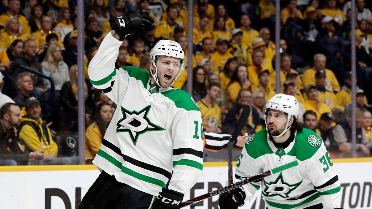Dallas Stars center Jason Dickinson (16) celebrates after scoring a goal against the Nashville Predators during the first period in Game 5 of an NHL hockey first-round playoff series Saturday, April 20, 2019, in Nashville, Tenn. (AP Photo/Mark Humphrey)