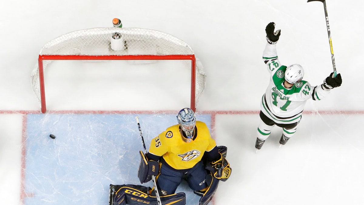 Dallas Stars right wing Alexander Radulov (47), of Russia, reacts after scoring his second goal against Nashville Predators goaltender Pekka Rinne (35), of Finland, during the second period in Game 5 of an NHL hockey first-round playoff series Saturday, April 20, 2019, in Nashville, Tenn. (AP Photo/Mark Humphrey)