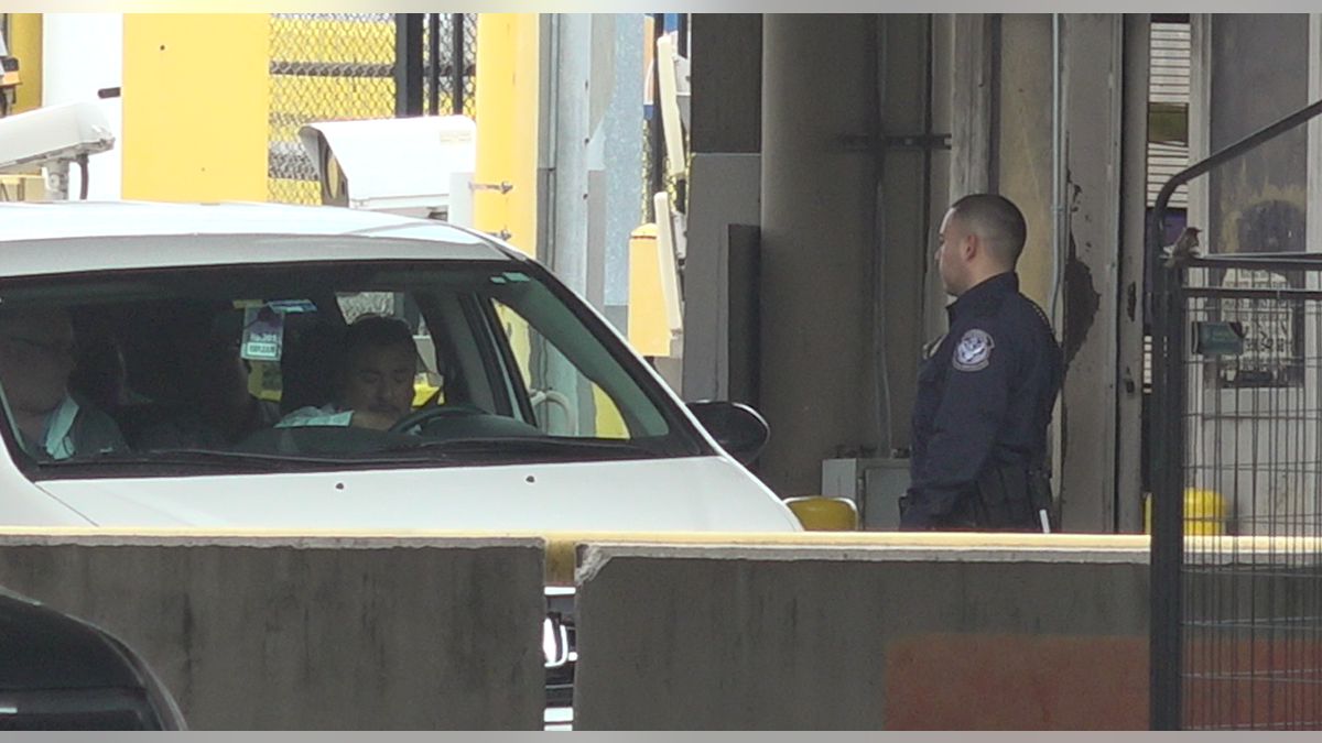 Up to 750 Customs and Border Protection officers have been re-assigned from ports of entry to help process the influx of migrants from Central America.