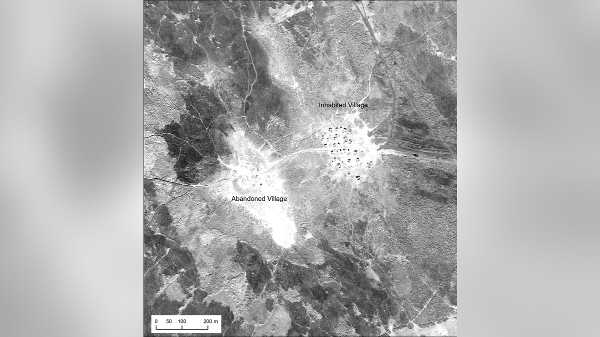 An inhabited Marsh Arab village and adjacent abandoned village in southern Iraq, photographed during a U2 mission in January 1960.