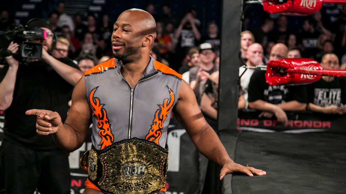 Jay Lethal poses at ringside with the ROH World Championship
