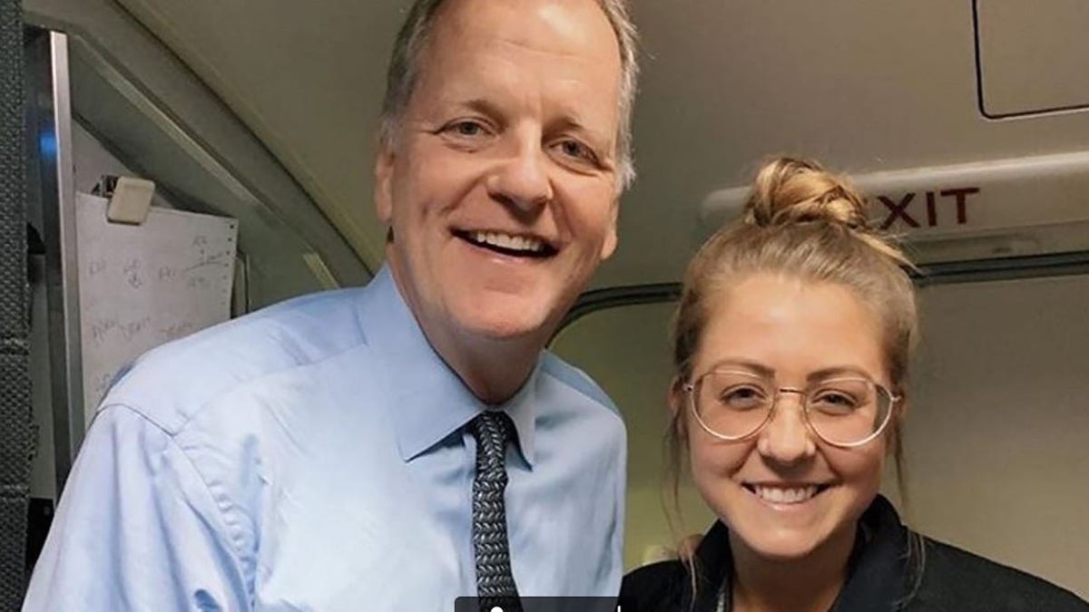 American Airlines CEO Doug Parker (left) with flight attendant Maddie Peters. 