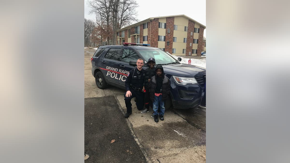 Officer Lynema spotted Thomas Daniels running for his school bus and offered him a ride, with his mom's permission, when the bus didn't stop.