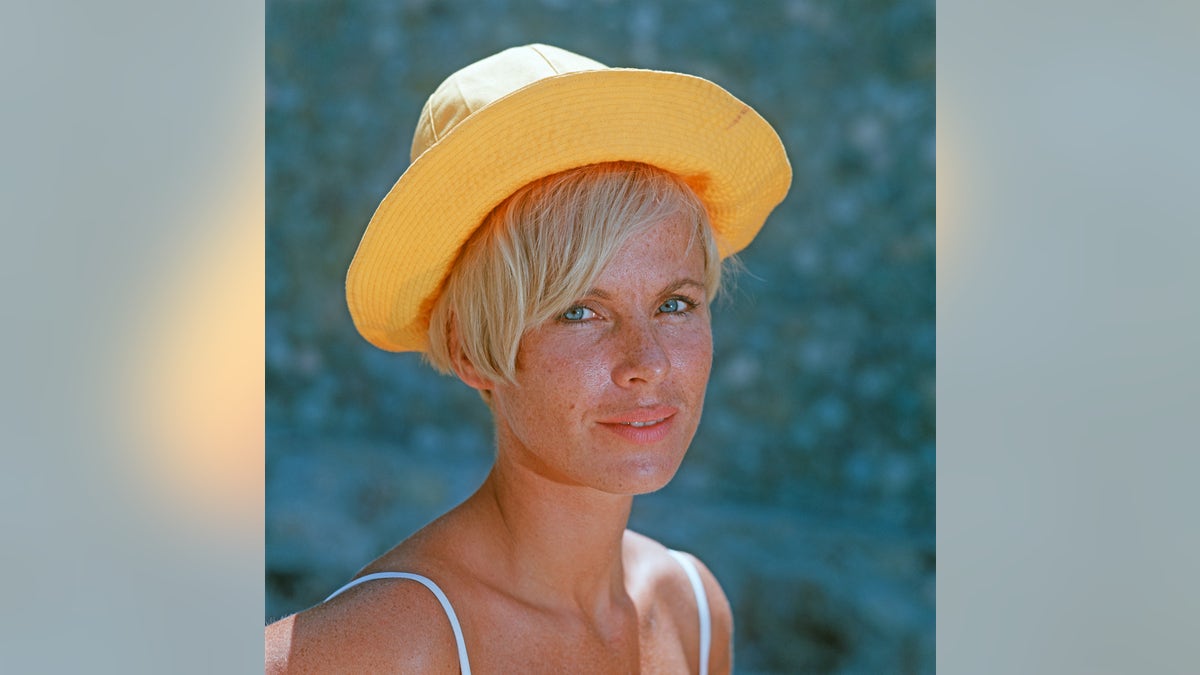 Portrait of the Swedish Bibi Anderson with a yellow fisherman hat; the actress, born Berit Elisabeth Andersson in Stockholm, is famous for her performances in theatre plays and in films, as a muse of the great director Ingmar Bergman. 1970s. (Photo by Mondadori Portfolio by Getty Images)