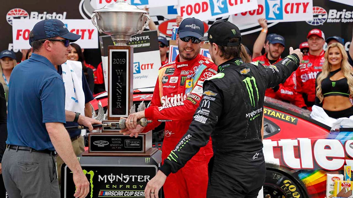 Kurt (in black suit) said he would've wrecked Kyle (in red suit) to get the win if he had the chance.