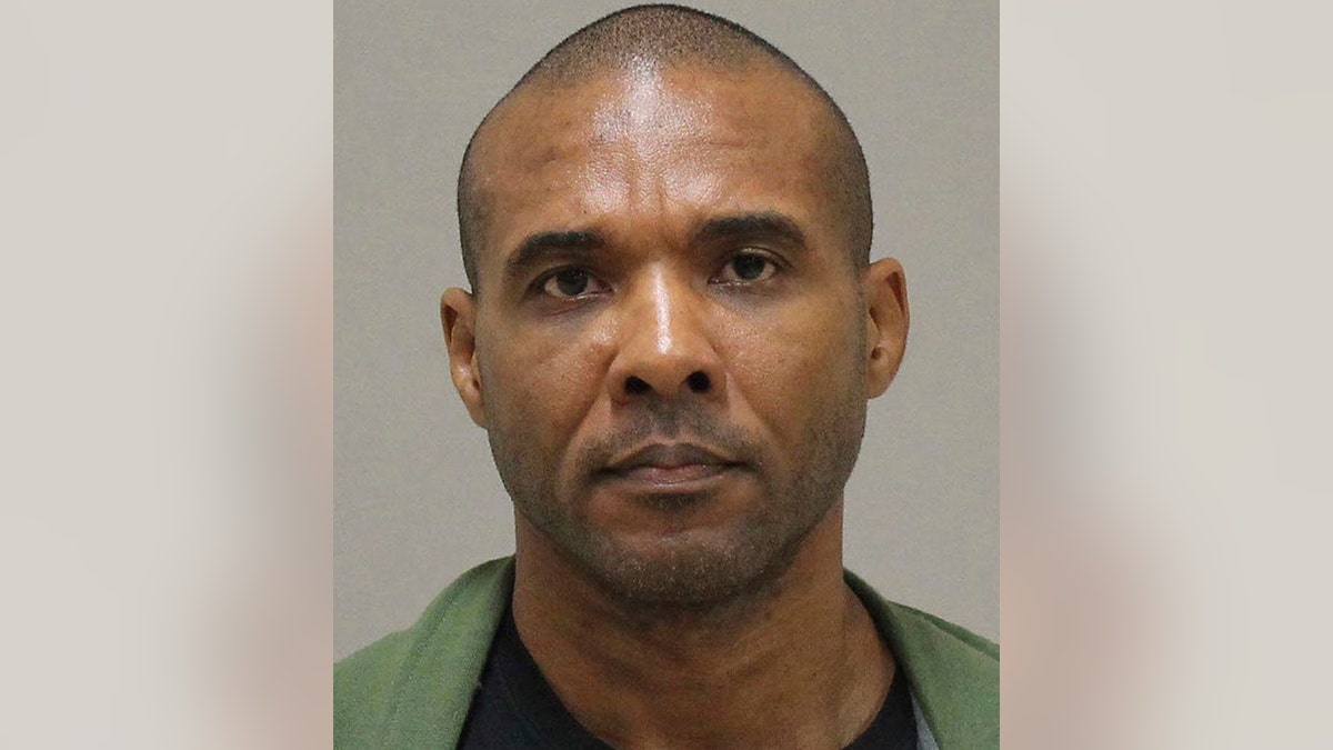 Cedric Marks, a 44-year-old MMA fighter, and his 26-year-old girlfriend, Maya Maxwell, have been indicted in Texas on capital murder charges in the killings of two people whose bodies were found in a shallow grave in Oklahoma. (Kent County Michigan Sheriff's Office via AP)
