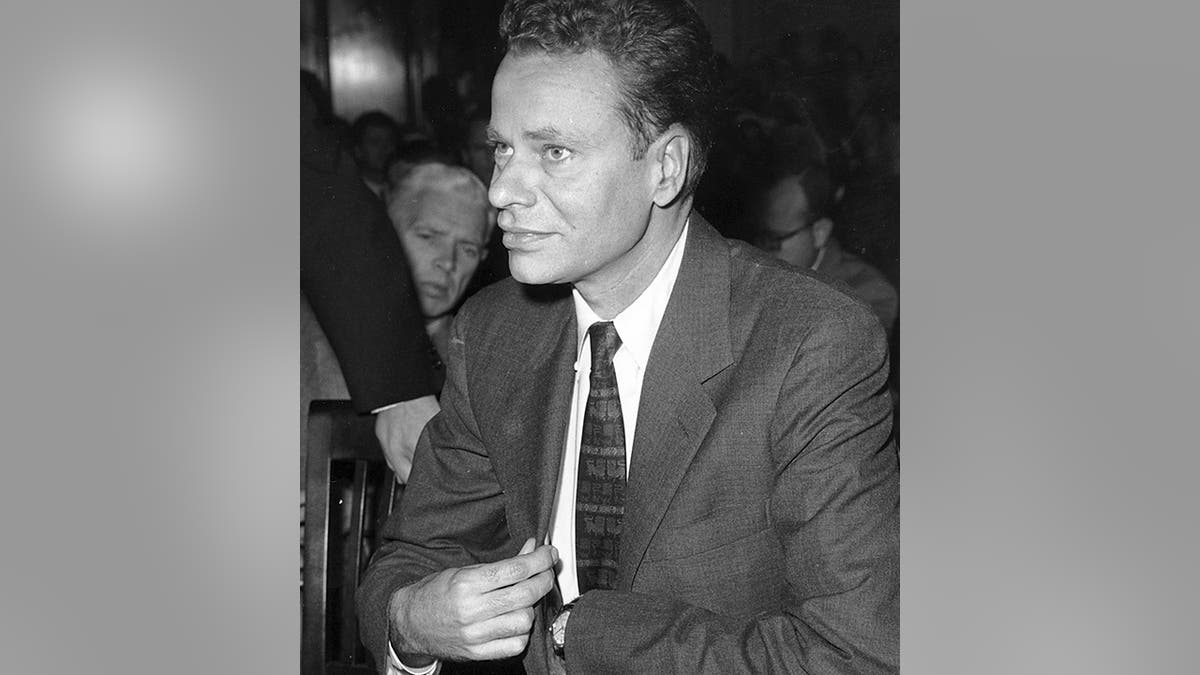 In this Nov. 2, 1959 file photo, Charles Van Doren sits as a witness before Congress in Washington during a hearing on rigged television game shows.