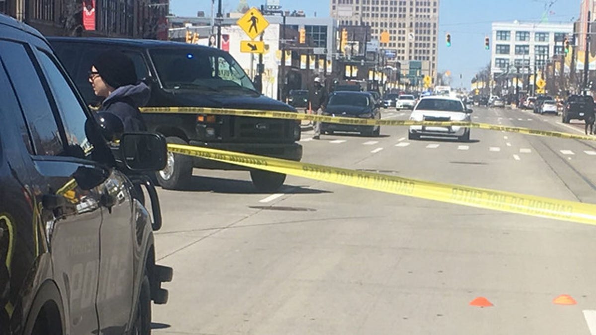 A man was shot in the face and shoulder after a argument on a bus in Detroit over some gym shoes, according to police.