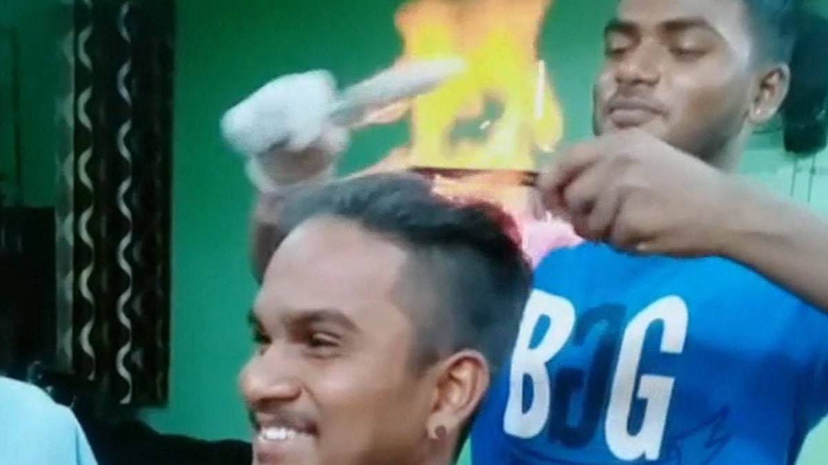 Footage taken at the salon in Chennai, south India, detailed the hairdresser continuing to brush the customer’s tresses, until the flame burned out after 12 seconds.