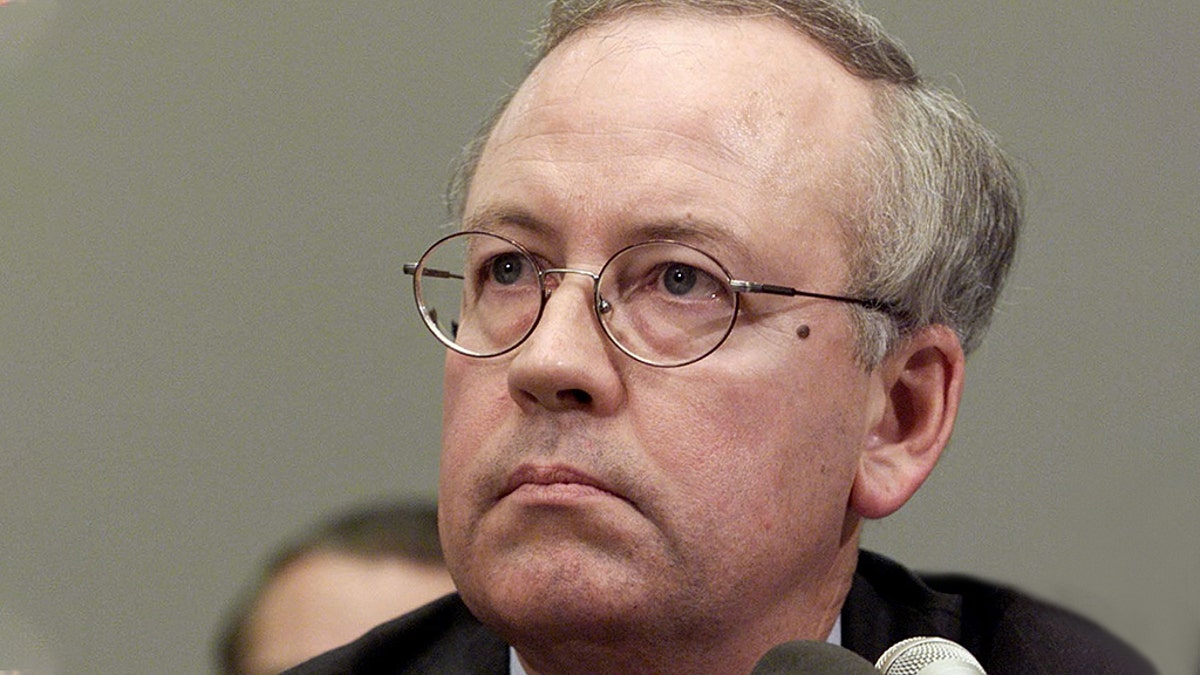 Independent counsel Kenneth Starr reading from the United States Constitution during the Clinton impeachment inquiry of the House Judiciary Committee on Nov. 19, 1998.
