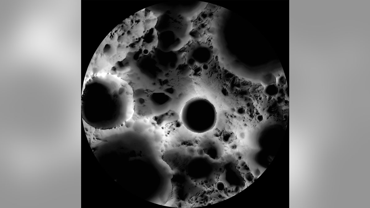 In this multi-temporal illumination map of the lunar south pole, Shackleton crater (19 km diameter) is in the center, the south pole is located approximately at 9 o'clock on its rim. The map was created from images from the camera aboard the Lunar Reconnaissance Orbiter. (Credit: NASA/GSFC/Arizona State University)