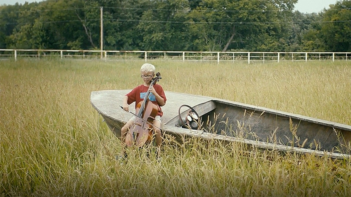 “Nebraska is kind of like that odd kid – slightly peculiar, but interesting when you spent time with him. Some people won’t spent the time, but maybe you will,” an unseen narrator says in one video, which features a little boy playing a cello alone in a cornfield.