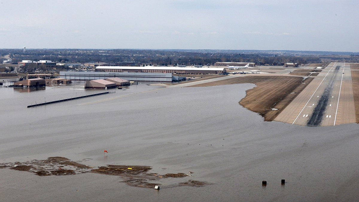 FILE: An aerial view of Offutt Air Force Base and surrounding areas in Nebraska affected by flood waters. 