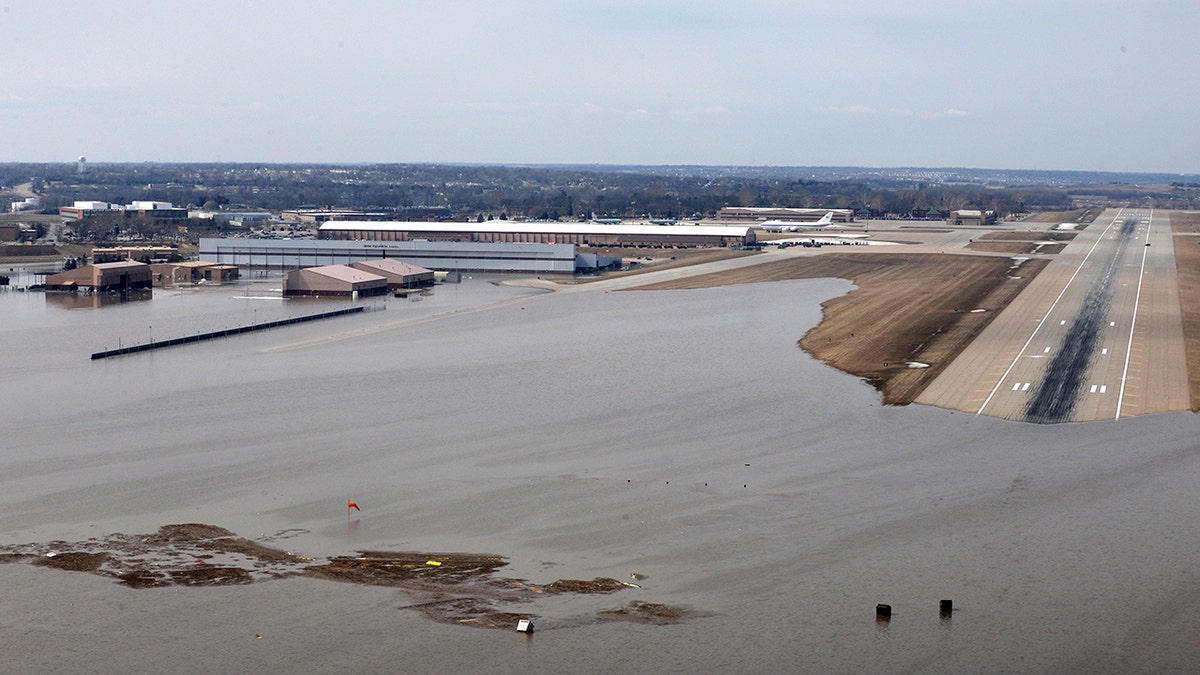 FILE: An aerial view of Offutt Air Force Base and surrounding areas in Nebraska affected by flood waters.