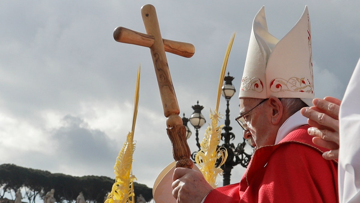 Pope Francis arrives to celebrate Palm Sunday Mass in St. Peter's Square at the Vatican, Sunday, April 14, 2019. The Roman Catholic Church enters Holy Week, retracing the story of the crucifixion of Jesus and his resurrection three days later on Easter Sunday.