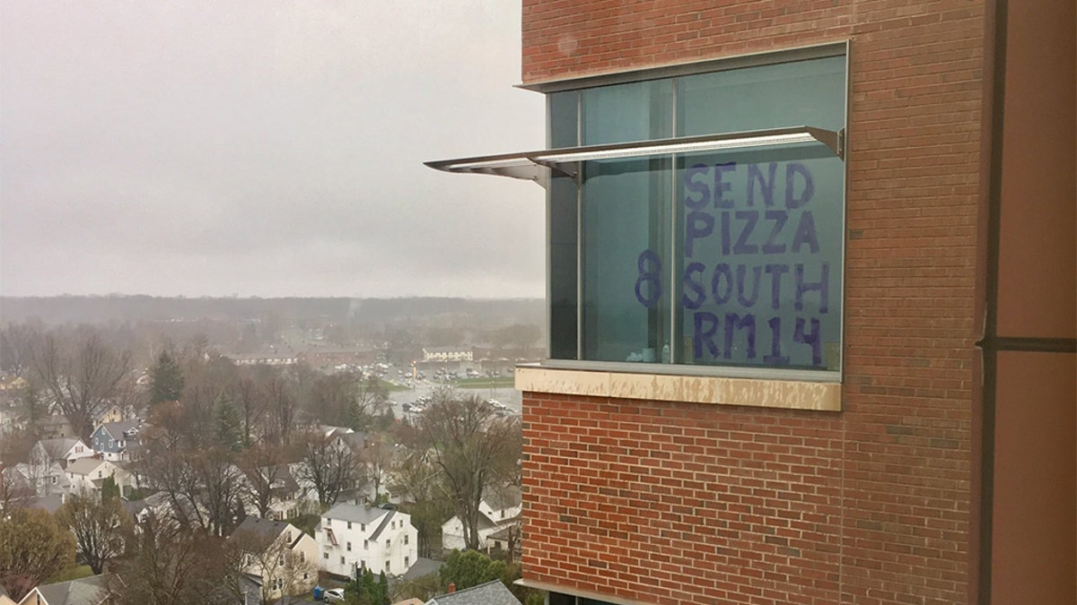 Favro posted the sign in the window as a surprise for his care team.