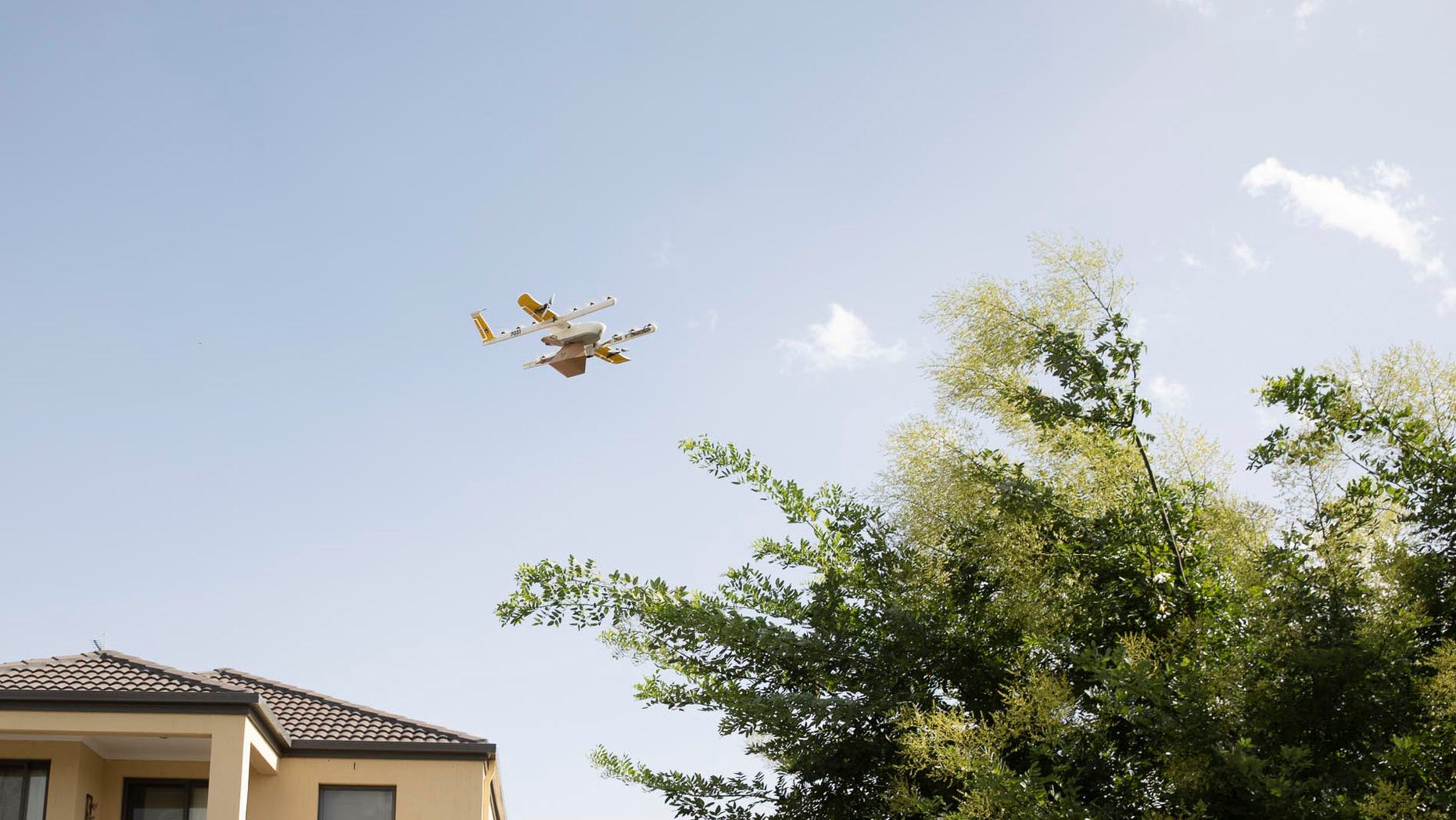 Project Wing launched its first commercial drone delivery service in Australia's capital. The drones lower small items to the front yards of eligible residences by string. (Wing Australia)