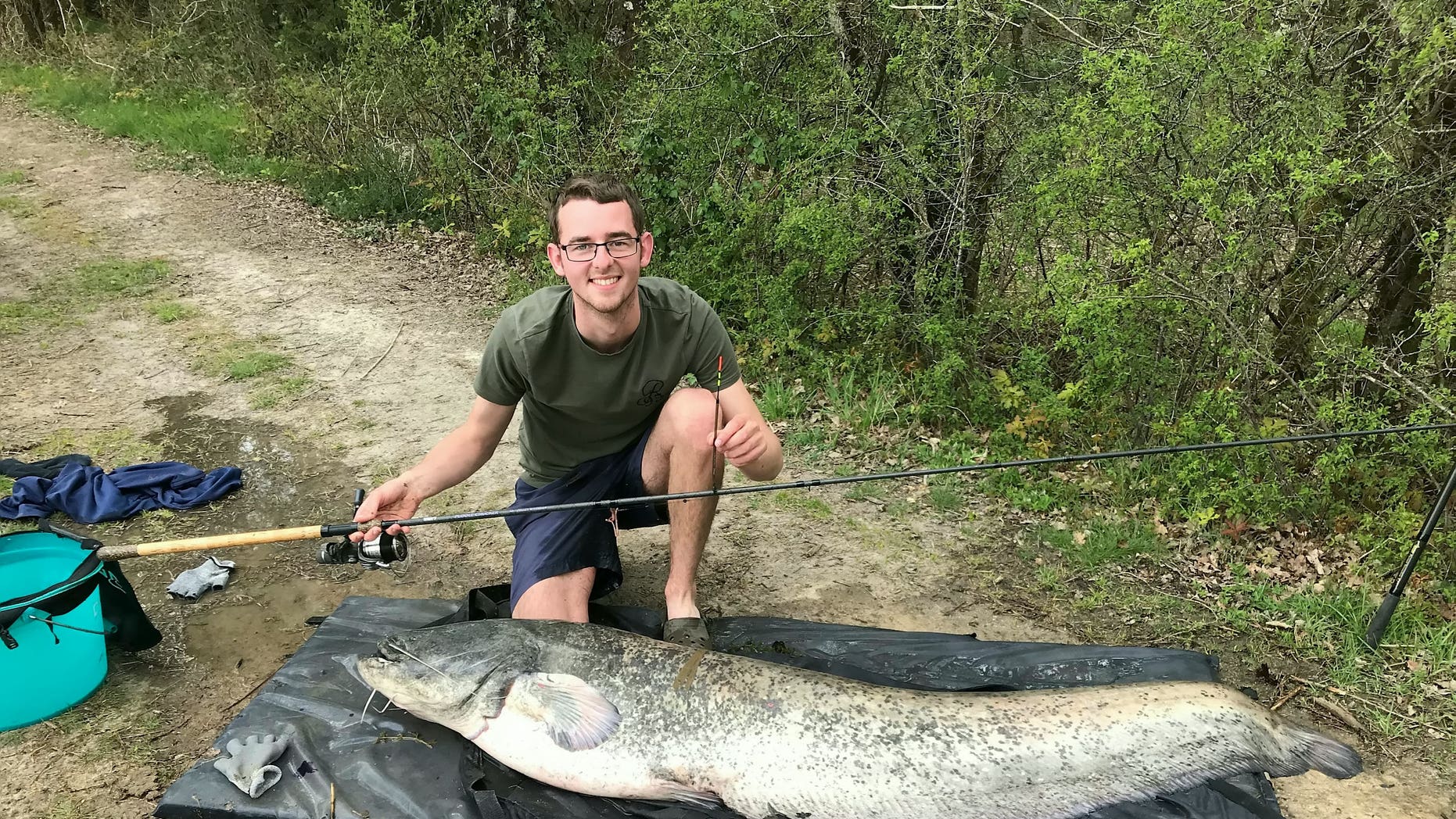 Fisherman reels in 102-pound catfish I-was-catfished-337616