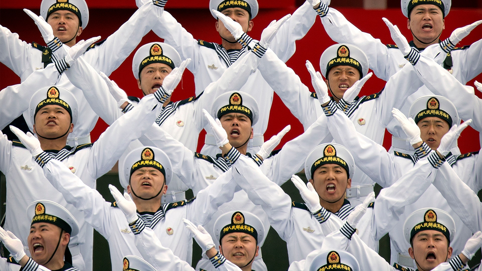 A Chinese navy chorus performs during a concert featuring Chinese and foreign military bands in Qingdao, April 22, 2019.