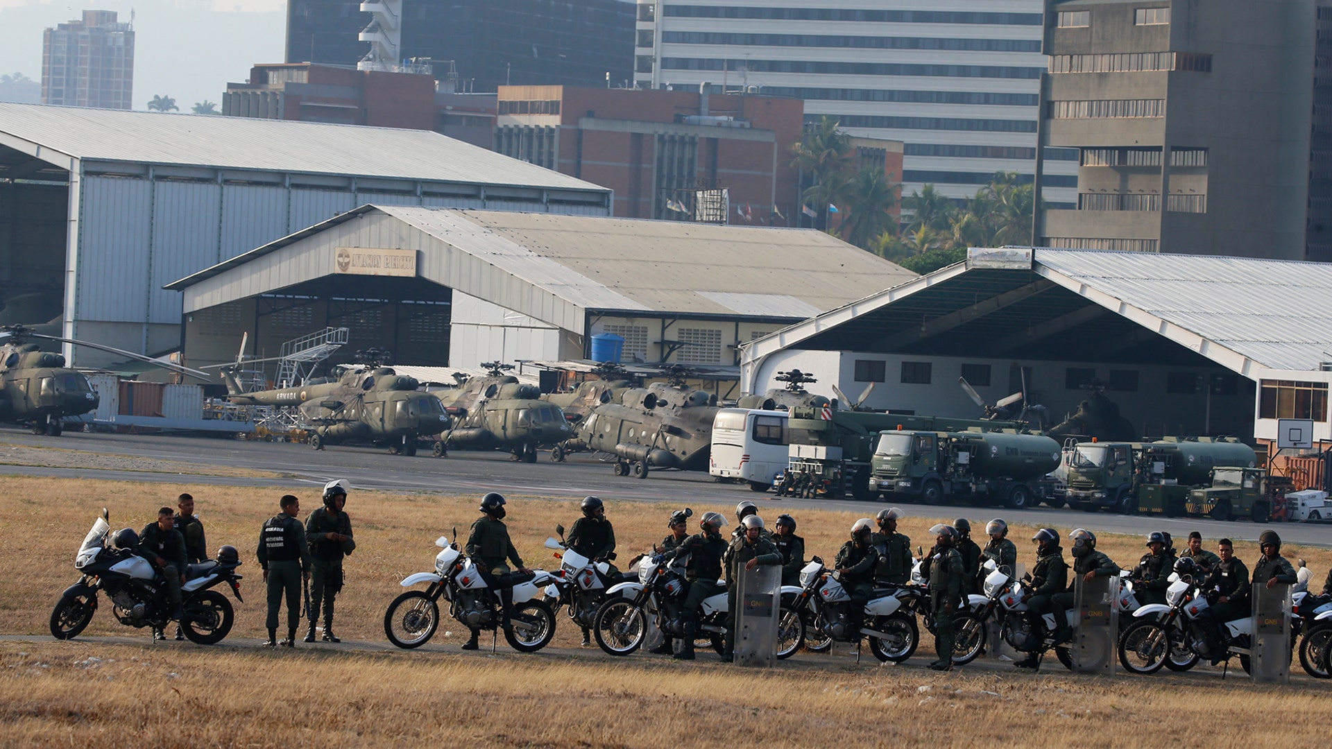 Military personnel loyal to Venezuela's President Nicolas Madura stand inside La Carlota air base in Caracas, April 30, 2019.