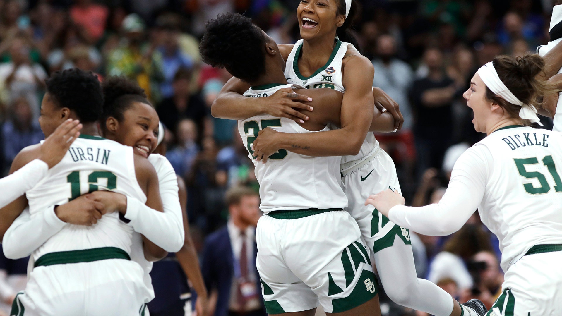 Baylor players celebrate after defeating Notre Dame in the women's Final Four championship game in Tampa, April 7, 2019.