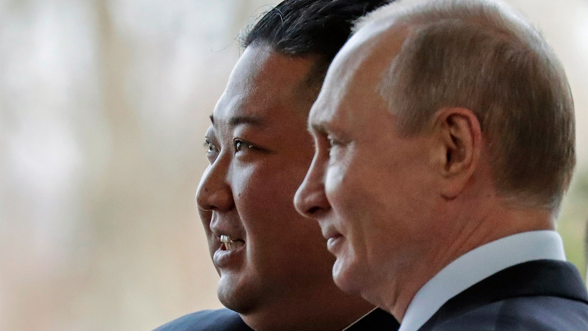 Russian President Vladimir Putin, and North Korea's leader Kim Jong Un pose for photographers during their meeting in Vladivostok, Russia, April 25, 2019. 