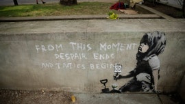 Possible Banksy artwork appears near London climate change protest