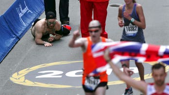 Marine who crawled across Boston Marathon finish line for fallen comrades invited to run NYC Marathon