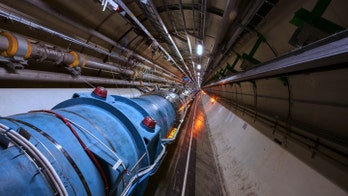 The world's largest atom smasher could be tweaked to hunt 'dark world' particles