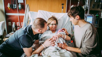 Nebraska woman, 61, gives birth to granddaughter after serving as surrogate for son, his husband