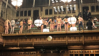 Topless climate change protesters arrested after interrupting Brexit debate in British Parliament