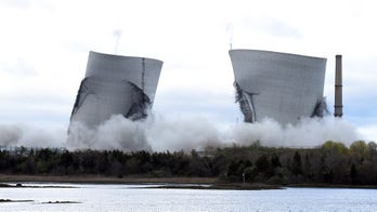Massachusetts power plant cooling towers demolition draws spectators