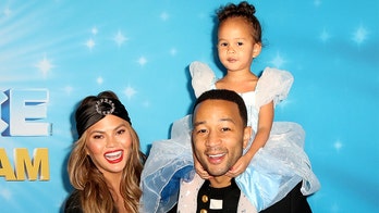 Chrissy Teigen says she and John Legend share ‘bad guy’ disciplinary role as parents