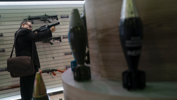 Gun makers at defense fair seek opening of Brazil market