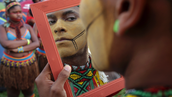 Indigenous Brazilians gather to protest outside Congress